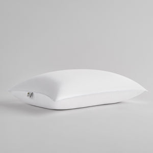 White pillow on a gray background