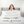woman with elbows on stack of best feather pillows from Standard to King size