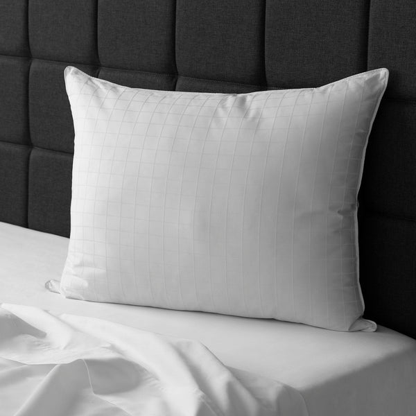 Sobella medium best pillow for side sleepers, leaning upright against bed